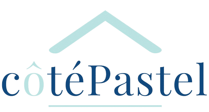 Logo côtéPastel bleu marine et turquoise avec toit stylisé et ligne de soulignement.